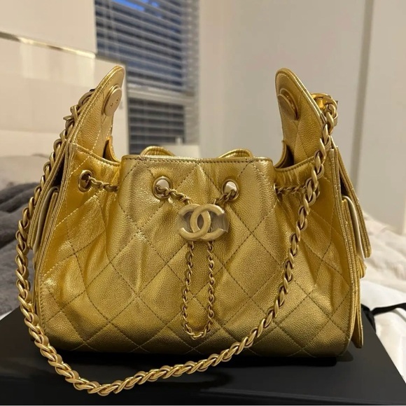 CHANEL Handbags - Chanel 25 Mini Gold Caviar leather